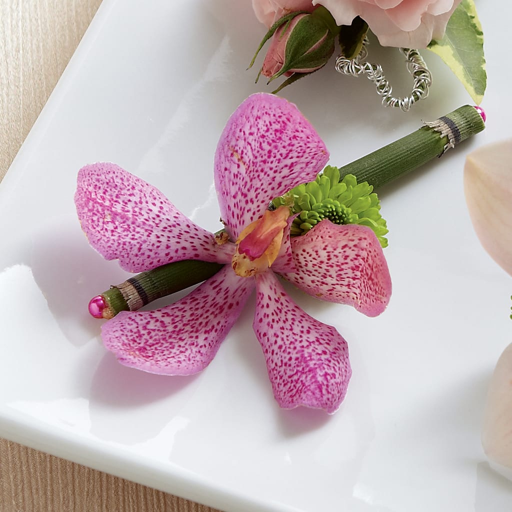 Pink Mokara Boutonniere – DON'S FLORAL STUDIO, Leon IA